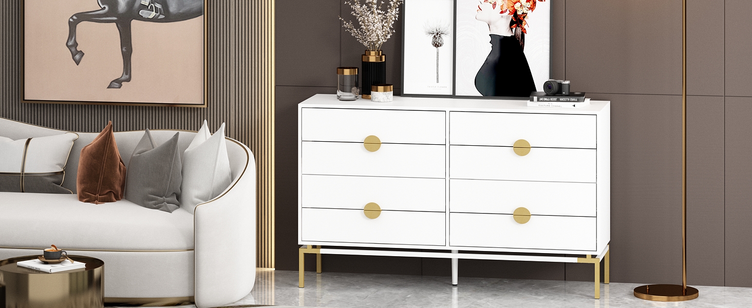 white dresser with gold round handles on a stand