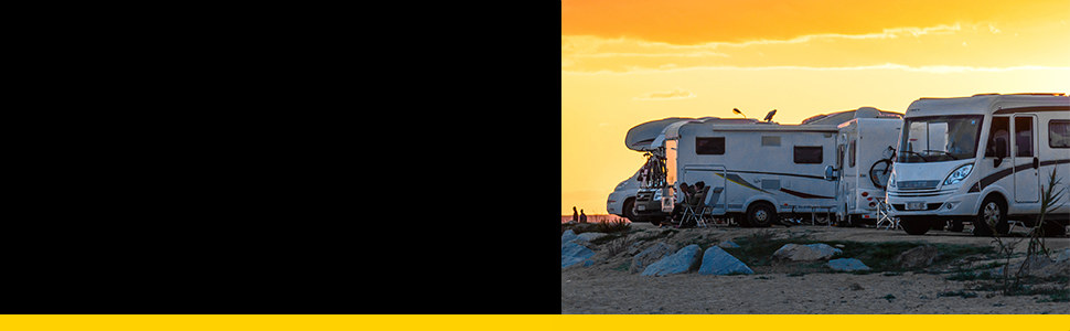 travel trailers parked together at sunset, built for the road